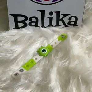 🆕👁👀💚🤍 Green/White Silicone Bracelet Wristband with 💚👁Monster INC charm.